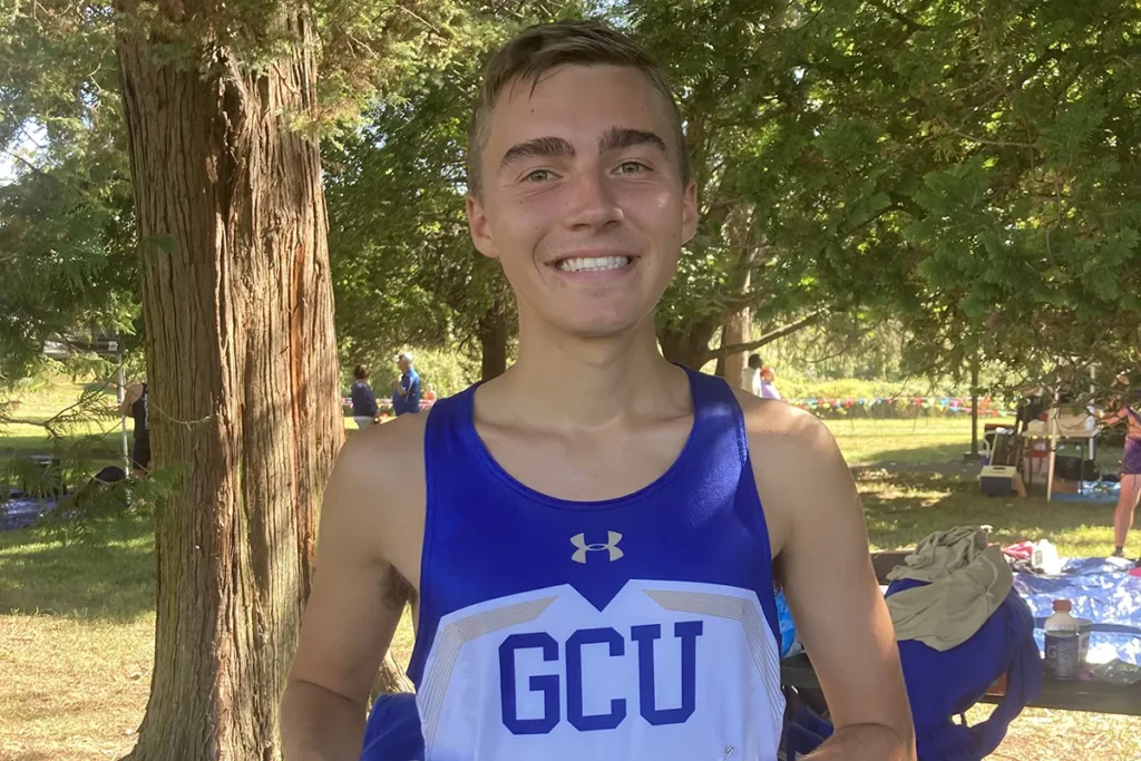 GCU male track student smiling