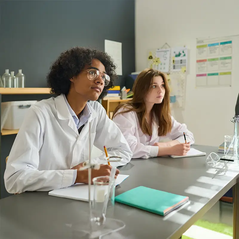 Chemistry students taking notes