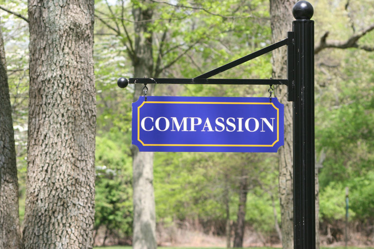 Compassion Mercy core value sign