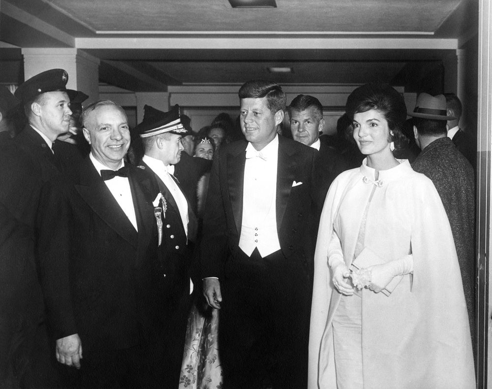 Black and white photo of JFK and his wife