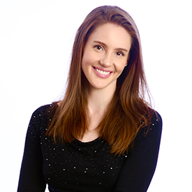 A portrait of Marci Mazzarotto looking at the camera
