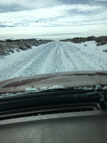 Snow-covered road to Mia Corona's house in New Mexico