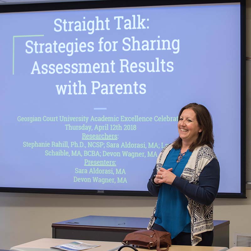 Stephanie Rahill presenting in a classroom