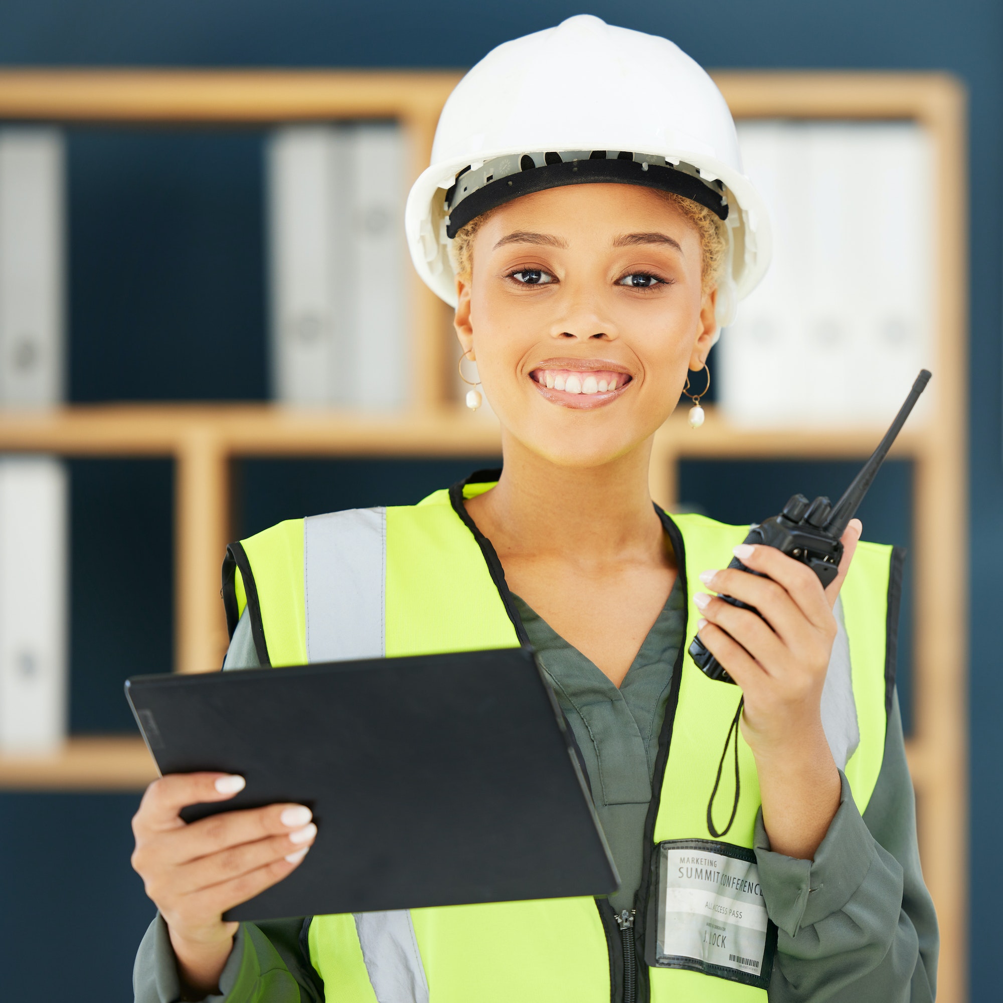 Construction, walkie talkie and portrait of black woman with tablet for engineering, building and a