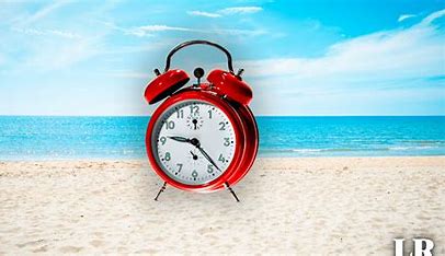 picture of clock on the beach