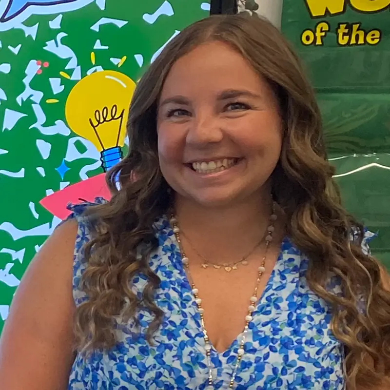 A female multisensory literacy student smiling