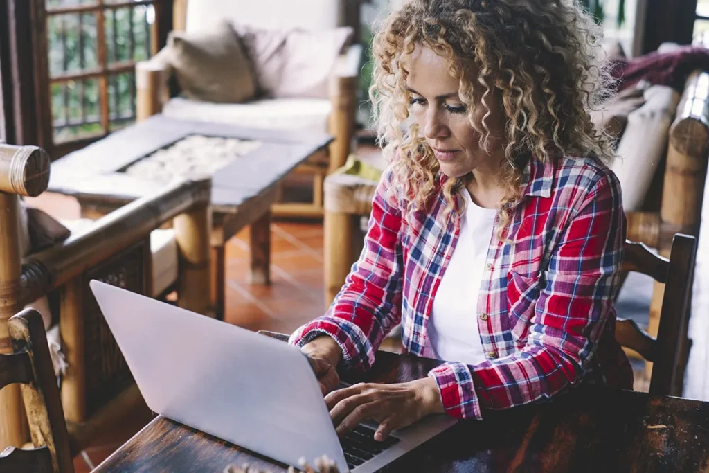 female online learning student on a laptop